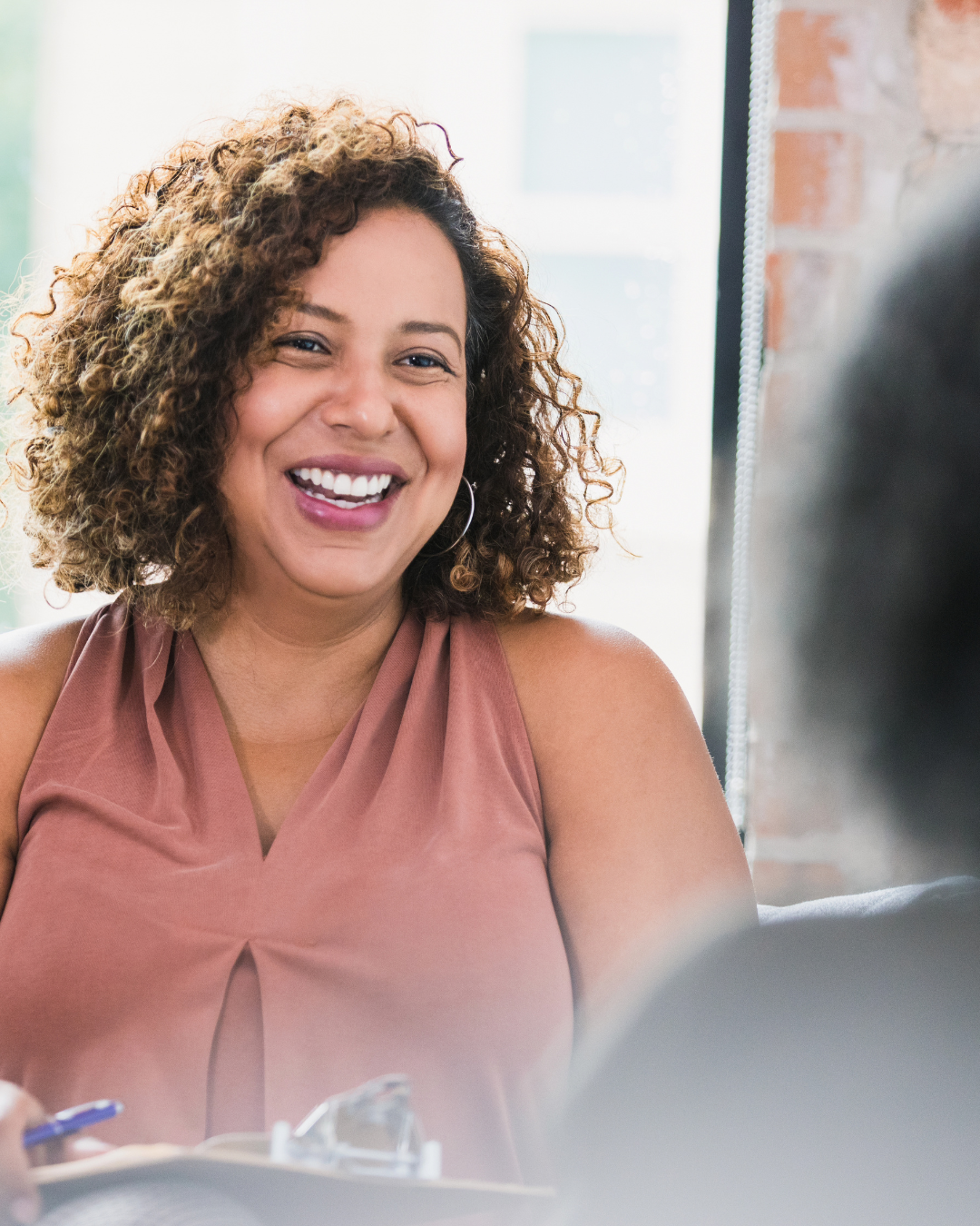 a woman in the middle of a In Person Therapy Session in PA