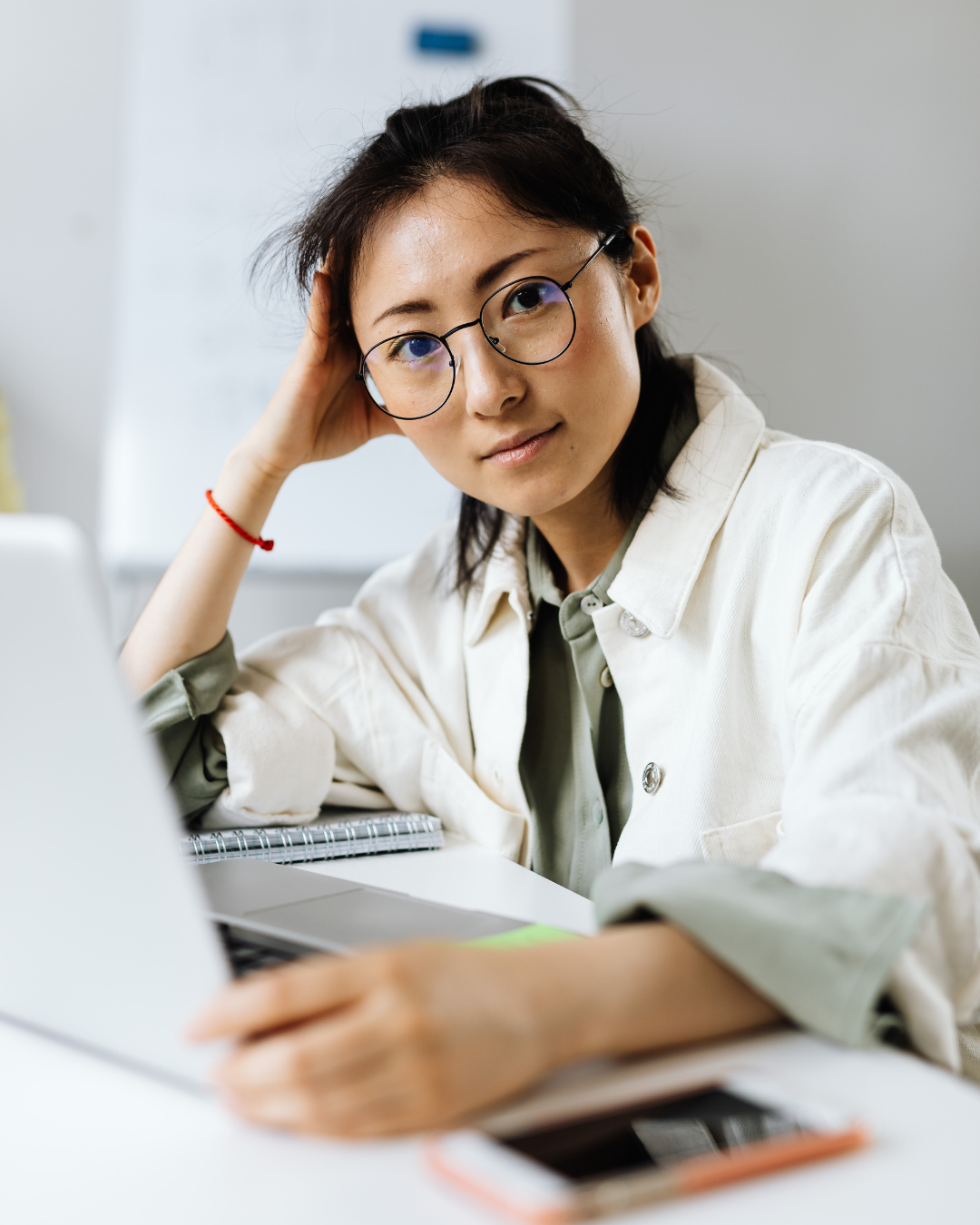 a woman of color researching Online Therapy NJ