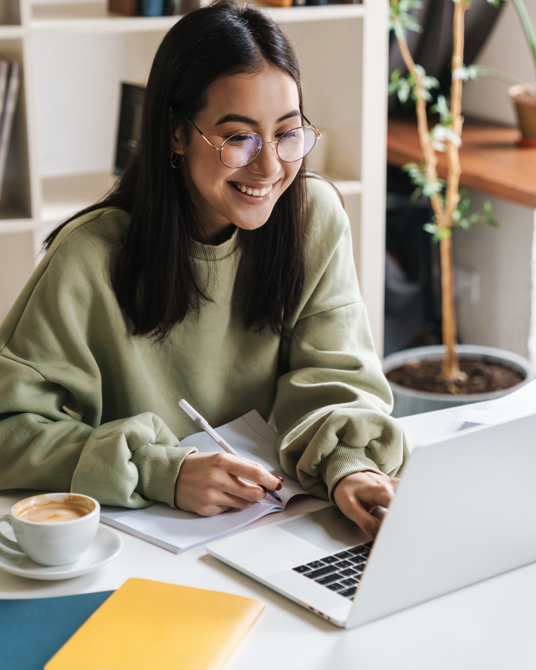 a woman of color happily looking up Virtual Therapy Services in NJ